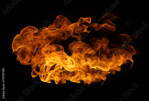 Fire and burning flame of explosive fireball isolated on dark background for abstract graphic design usage