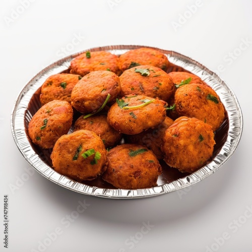 Plate of delicious copper-colored meat cakes