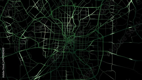 Zoom in road map of San Antonio Texas with green glowing roads on a black background.