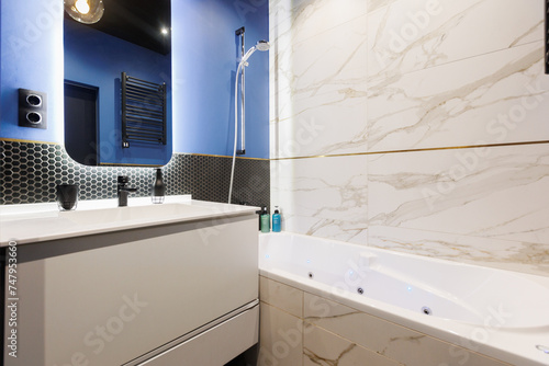 modern bathroom room with toilet and washing machine