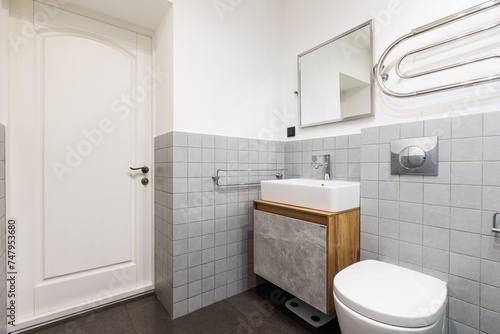 Fototapeta Naklejka Na Ścianę i Meble -  modern bathroom room with toilet and washing machine