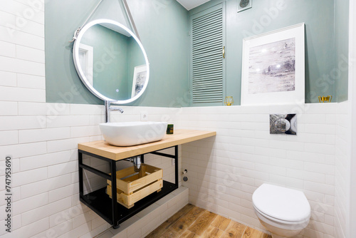 modern bathroom room with toilet and washing machine