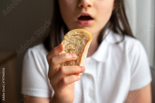 Child Eating Bread  Close-Up