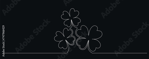 Clovers flower banner for Saint Patrick day - good lucky symbol, single line. Vector stock minimalism illustration isolated on black background for design template invitation frame. Editable stroke photo