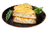 Croque Monsieur toasted sandwich with Cheese, Ham, Gruyere and Bechamel Sauce.  Isolated, Transparent background.