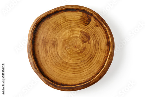 Handmade wooden plate isolated on a white background. Top view with copy space