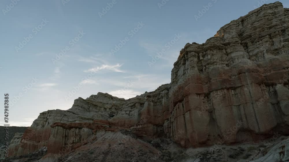 Timelapse of sunset sky over sandstone cliffs in Mojave Desert, California, USA Timelapse of sunset sky over sandstone cliffs in Mojave Desert, California, USA