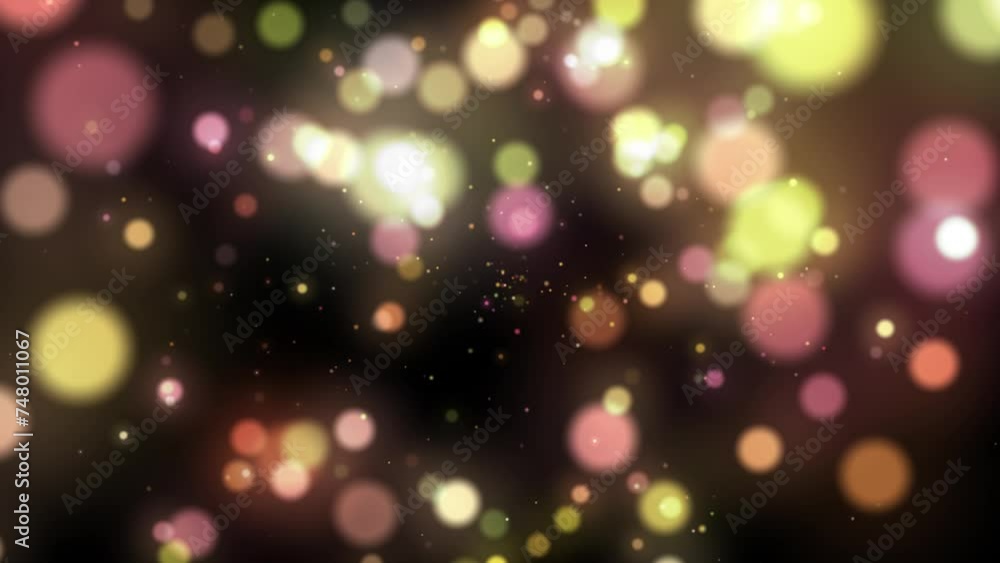 Colorful defocused particles bokeh with a blurred depth of field. Multi-colored bokeh moving floating particle animation. Small colored particles move against the dark background. Colorful defocused particles bokeh with a blurred depth of field. Multi-colored bokeh moving floating particle animation. Small colored particles move against the dark background.