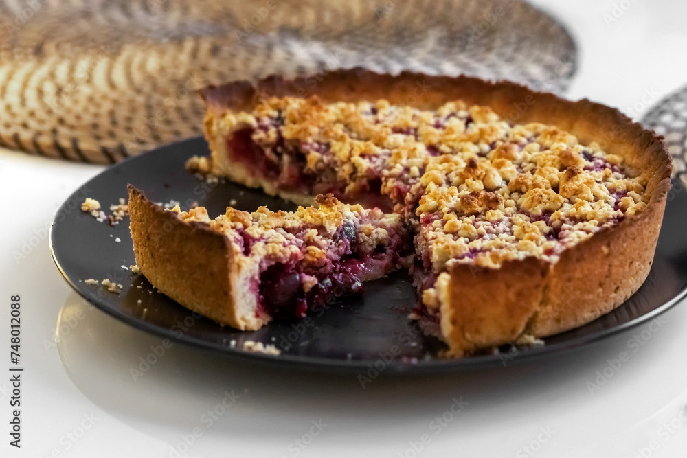 Cherry pie on a plate on the table. Photo Cherry pie on a plate on the table. Photo