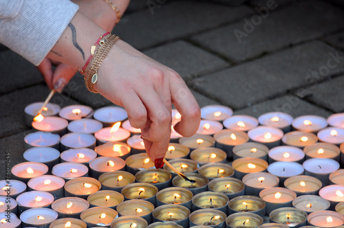 Lighting Memorial Candles