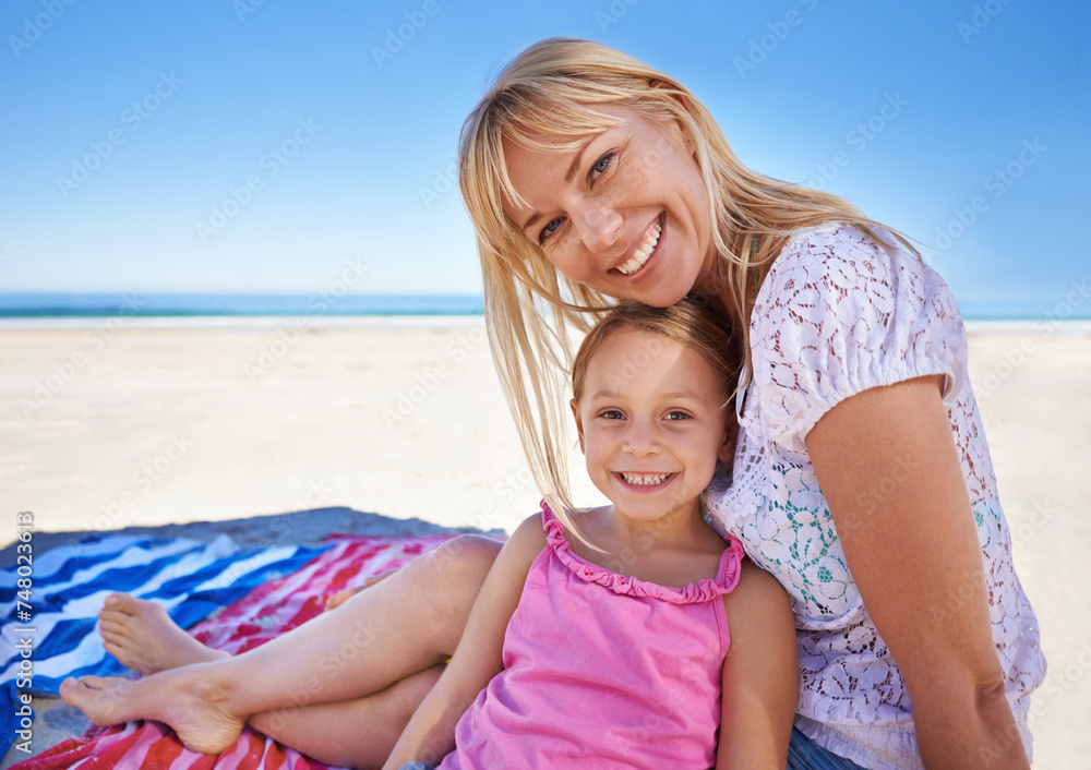 Portrait, happy mother and child at beach to relax on holiday, summer or vacation on blanket. Face, mom and smile of girl at ocean for adventure, travel or family bonding together outdoor on mockup