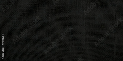Black burlap texture background. Sacking and bagging pattern. Top view.