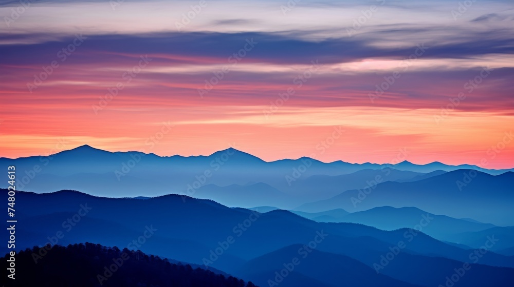 Twilight mountain range and vivid sky landscape
