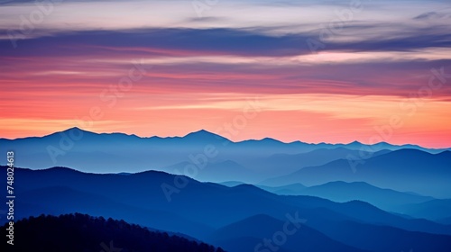 Twilight mountain range and vivid sky landscape © stocksbyrs