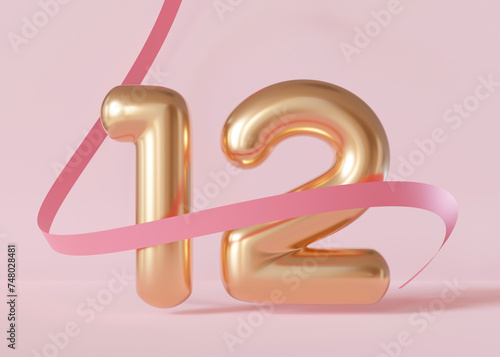 фотографія Golden shiny number twelve on pink background with ribbon