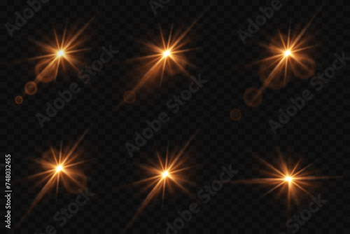Set of highlights. Flashes of rays and light. Explosion and spark effect. On a transparent background.