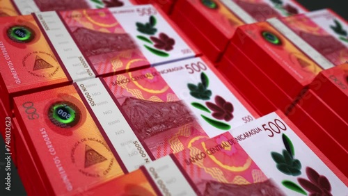 Nicaragua money Nicaraguan cordobas pack loop 3d animation. Loopable seamless concept of finance, cash, economy, business and bank. Camera moving over 500 NIO banknote bundle stacks. photo