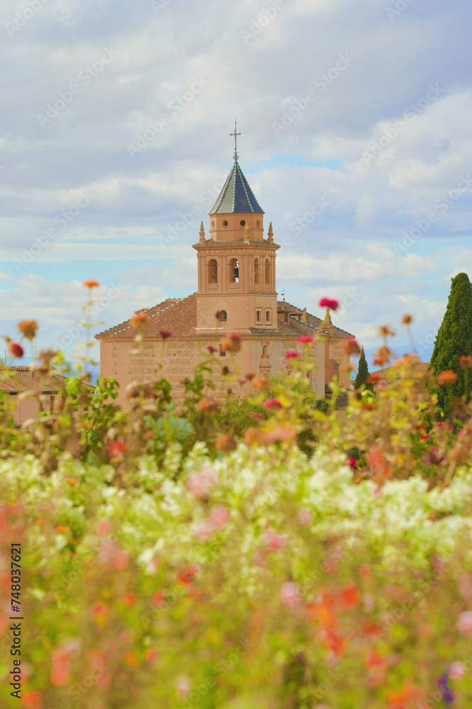 church in front of flowers
