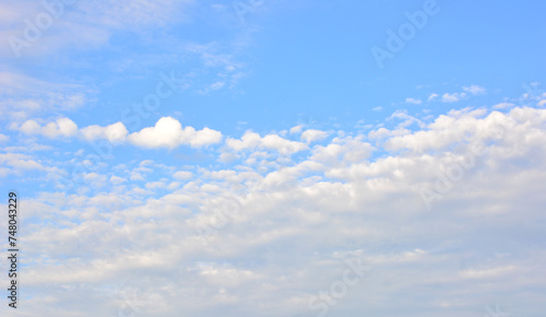 cloudscape with azure cky and white clouds   photo