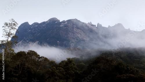 Mount Kinabalu  Sabah  Malaysia in a morning with fog  Kundasang