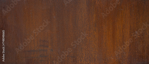 Grunge rusty orange brown metal corten steel stone background texture banner panorama..