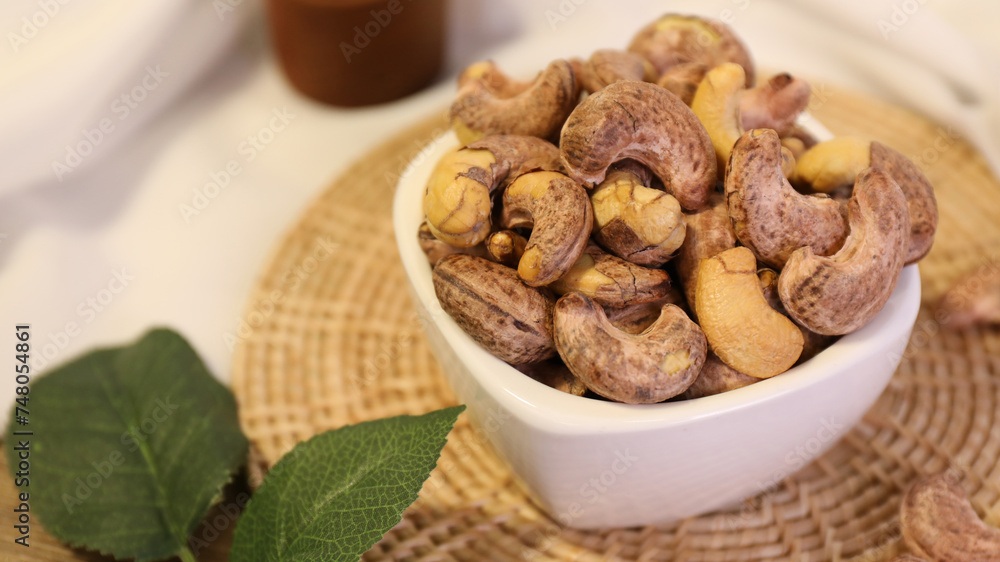Grilled cashew nuts in a bowl Grilled cashew nuts in a bowl
