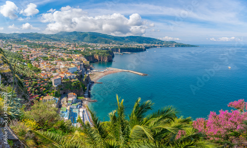 Overlook the idyllic Sorrento coastline, with sweeping views of azure waters and lush landscapes, epitomizing the charm of Italy's Amalfi Coast.