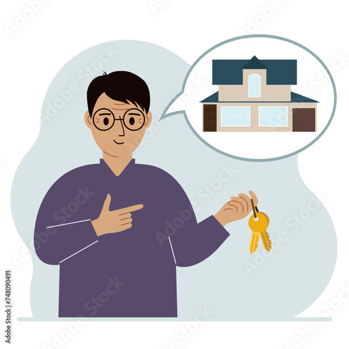 A man holds the keys to the house, and in his thoughts a beautiful house. The concept of buying, renting, selling real estate.