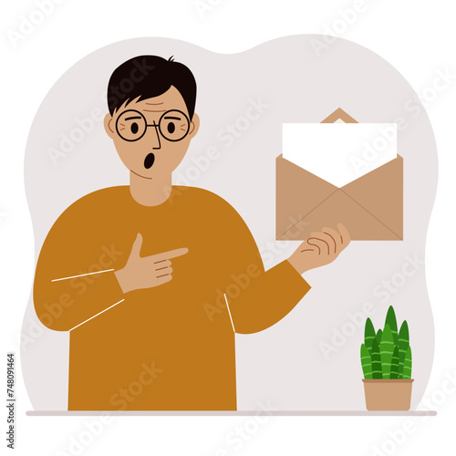 A man with an open envelope with a letter. Empty sheet of paper for text template. Mail concept. Sending a message, notification, invitation