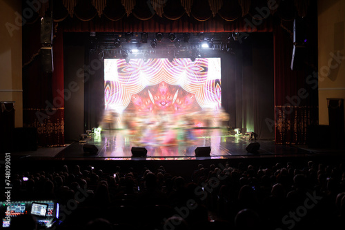 Сoncert on scene theater, stage light with colored spotlights and smoke.