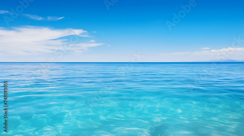 Eternal Blue: A Mesmerizing Azure Waterscape Adorned by a Clear Blue Sky © Lucas
