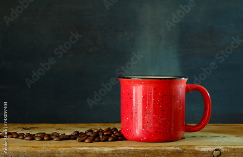 coffee cup with freshly brewed coffee on dark background,free copy space.