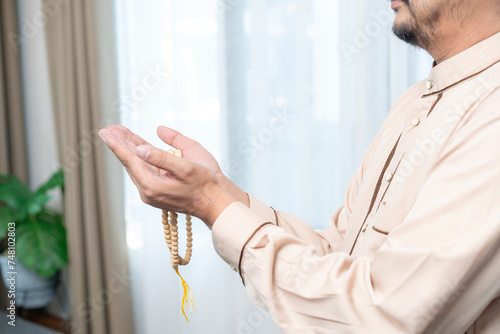Photography Asian muslim man offering prayer standing