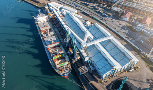 Photos Expansive aerial view of dynamic operations at a multipurpose industrial cargo t