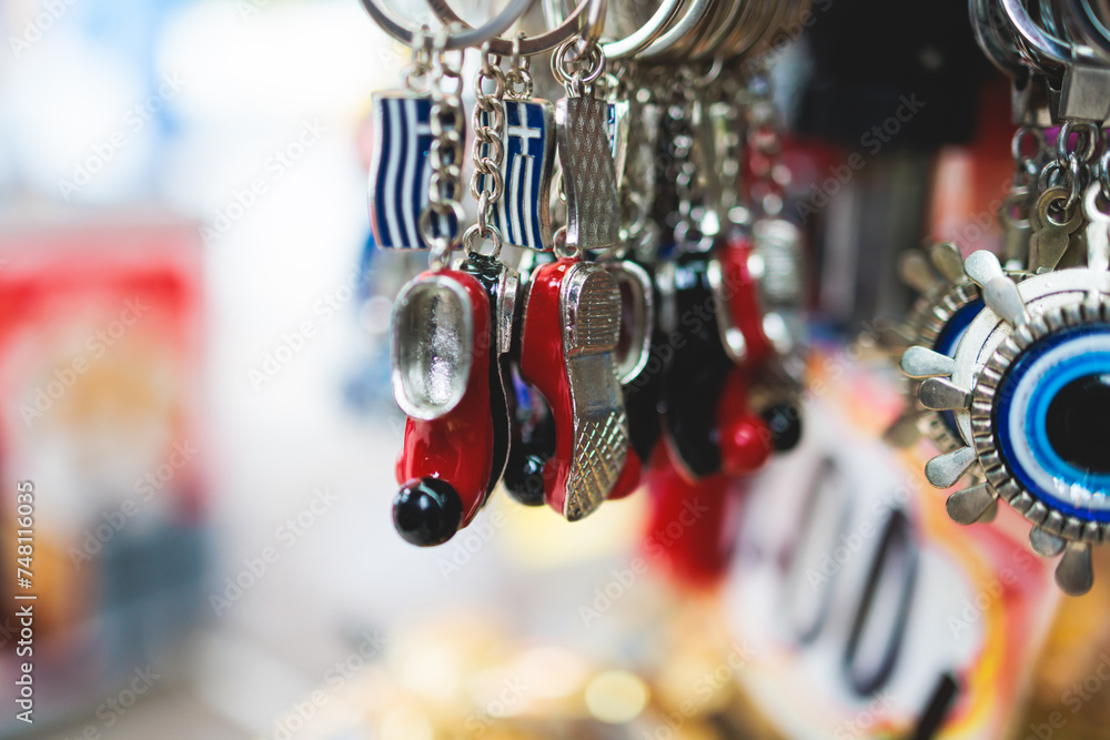 Fototapeta premium Traditional tourist souvenirs and gifts from Greece, fridge magnets with text 