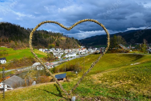 Tableau sur toile View of Gorenja vas village through a hear shape in Gorenjska, Slovenia