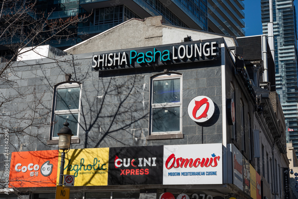 signage on the south facing side of 372 Yonge Street in downtown