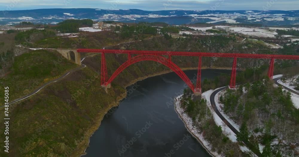 Winter view from drone of Garabit Viaduct, railway arch bridge in France Winter view from drone of Garabit Viaduct, railway arch bridge in France