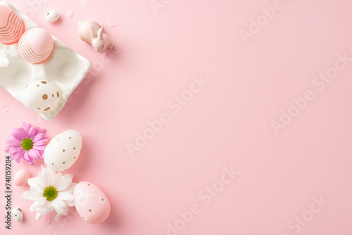 Trendy Easter scene captured from top view: eggs in trendy container, porcelain bunny, chrysanthemums, and confetti on a pastel pink base, ready for your text or marketing