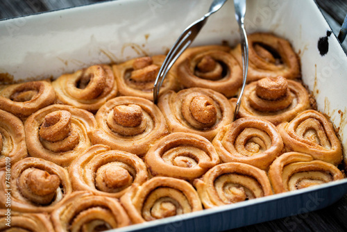 Cinnamon buns in a baking pan photo