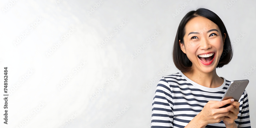 white background with asian woman using her mobile phone white background with asian woman using her mobile phone