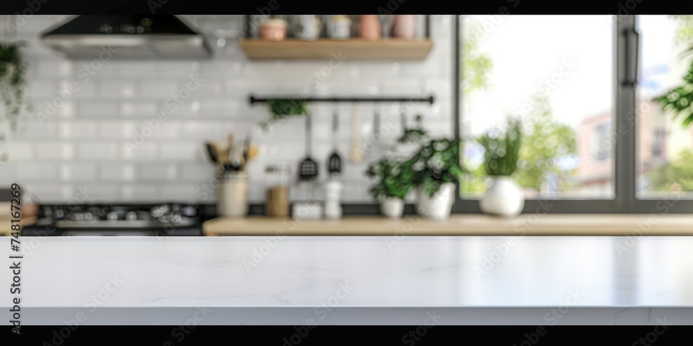 In the kitchen room interior background, there is a modern empty white marble table intended for product display. - obrazy, fototapety, plakaty 