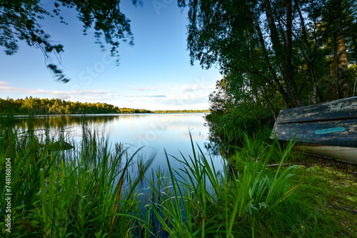 Fototapeta Naklejka Na Ścianę i Meble -  Idyllic lake Hönshyltefjorden, Kuppersjön in the forest near Ryd (Blekinge) in Smaland, Sweden with trees and water in summer