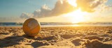 Tennis ball on the beach in the rays of the setting sun. Vacation Concept. Sport Concept with Copy Space. Beach Volleyball.