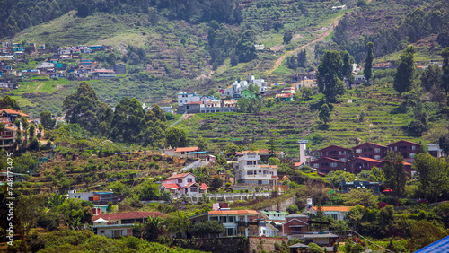 Beautiful view of cottage house on dense forest hill, Kodaikanal, Tamil nadu, INDIA photo