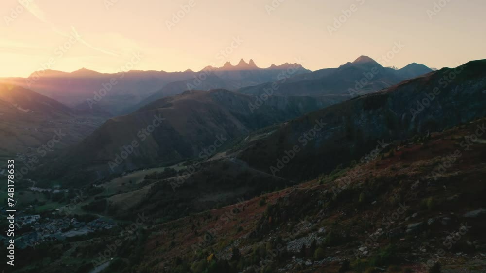 French Alps landscape of sunrise shine over Lac Guichard with rocky mountain and Aiguilles d arves massif in autumn at France French Alps landscape of sunrise shine over Lac Guichard with rocky mountain and Aiguilles d arves massif in autumn at France