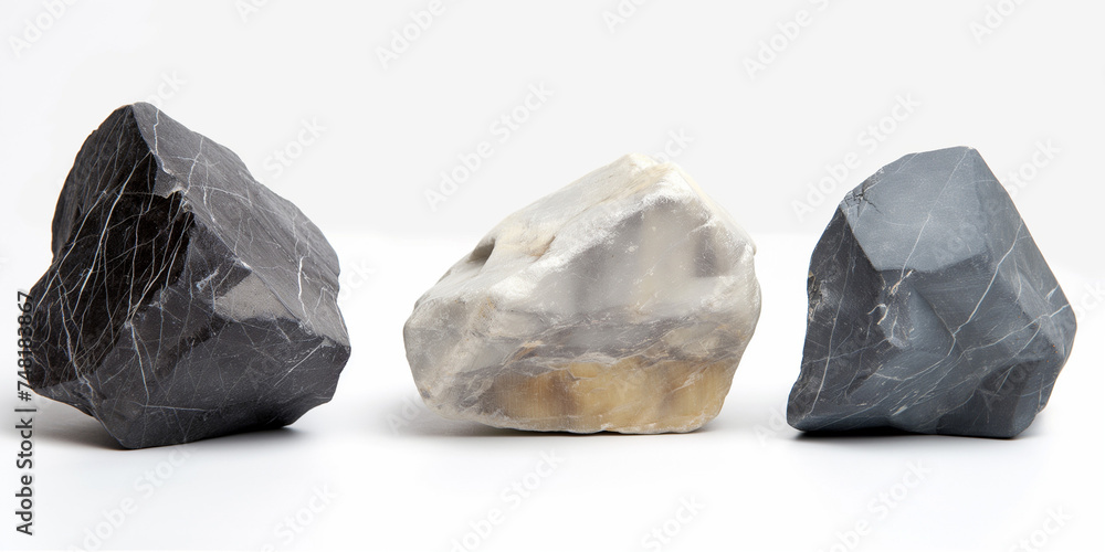 Set of colorful assorted different pebbles / rocks isolated on white background
