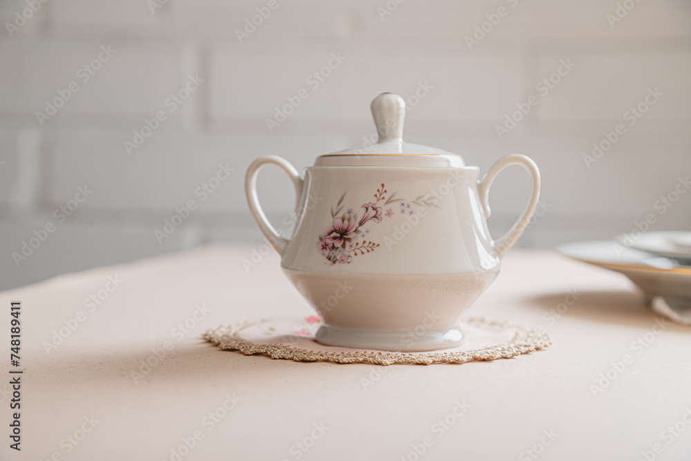 Fototapeta premium one vintage hand painted antique sugar pot with lid 