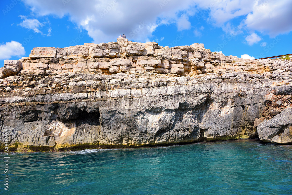 The caves of the ionian Sea side of Santa Maria di Leuca seen from the tourist boat	
