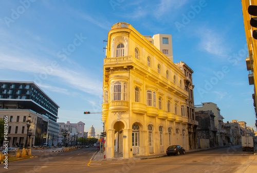 Historic buildings on Paseo del Prado at Calle Consulado Street in the morning in Old Havana (La Habana Vieja), Cuba. Old Havana is a World Heritage Site.  photo